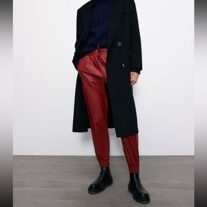 Red faux leather jogging pants